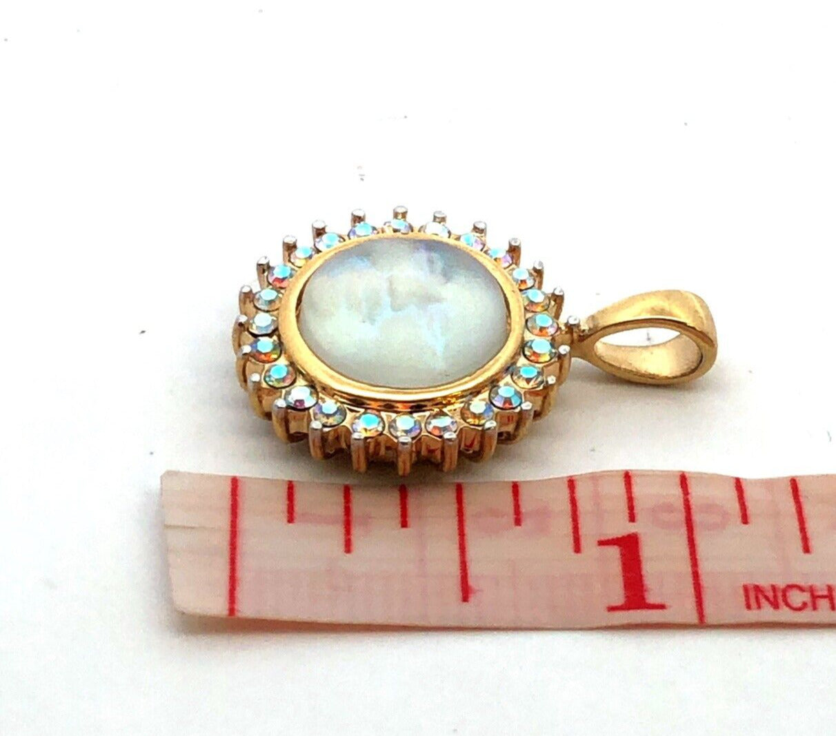 Kirk's Folly Gold Tone Aurora Bourealis Rhinestone Irridescent Man Moon Pendant
