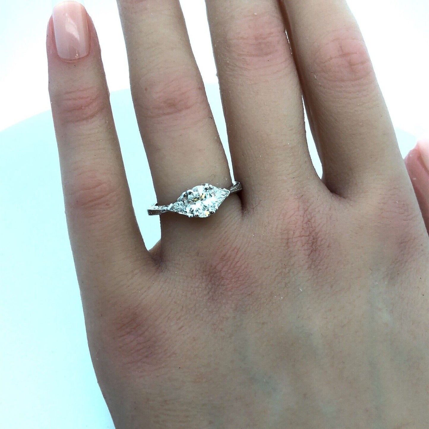 Estate Platinum Oval Diamond Trillion Accented Engagement Ring