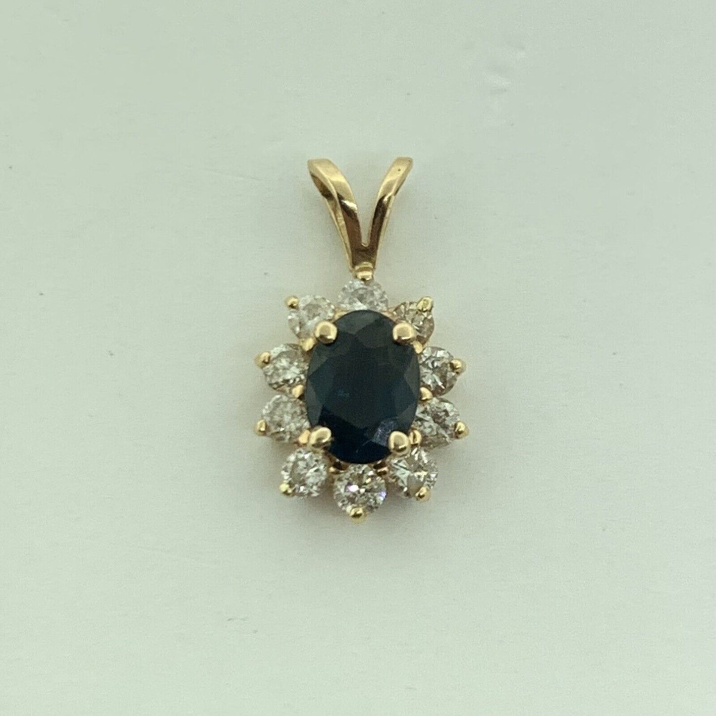 14K Yellow Gold Oval Blue Sapphire Diamond Halo Pendant