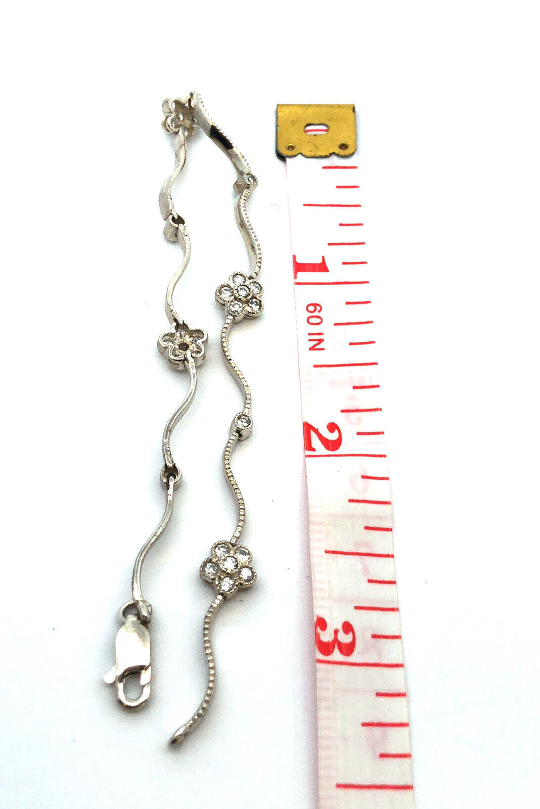 Designer 925 Sterling Silver Cubic Zirconia Flower Station Wavy Tennis Bracelet