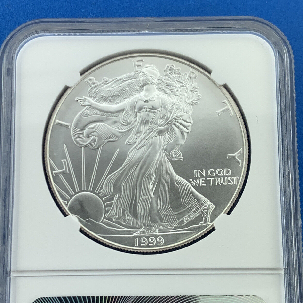 1999 $1 American .999 Silver Eagle Reverse Struck Thru Mint Error NGC MS69 Coin