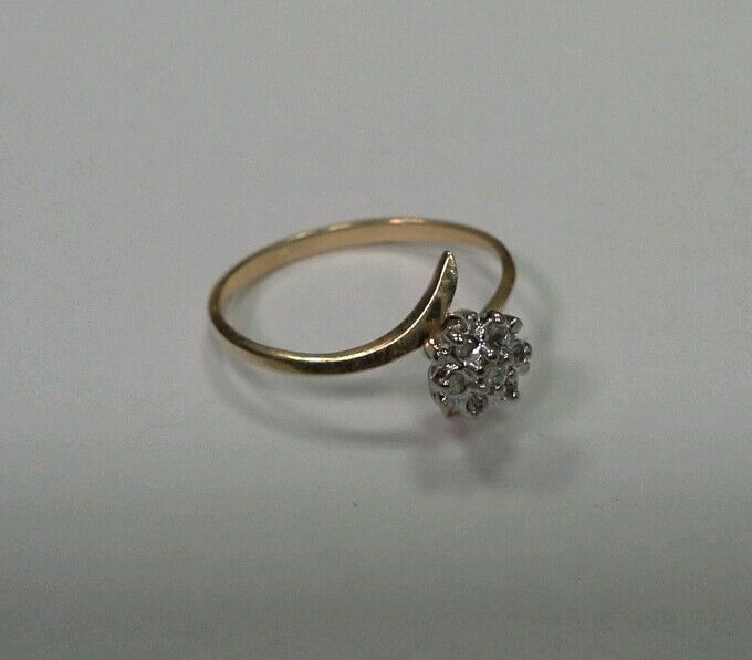 10k Yellow Gold Ring with .05tcw 1/20 Diamond Cluster Size 6.25