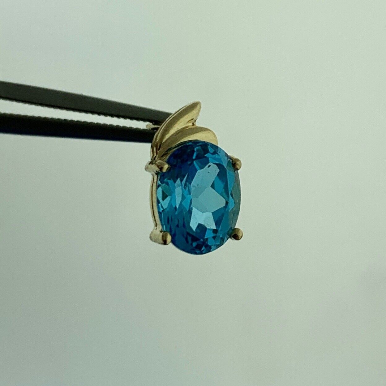 14K Yellow Gold Oval Blue Topaz December Anniversary Stud Earrings