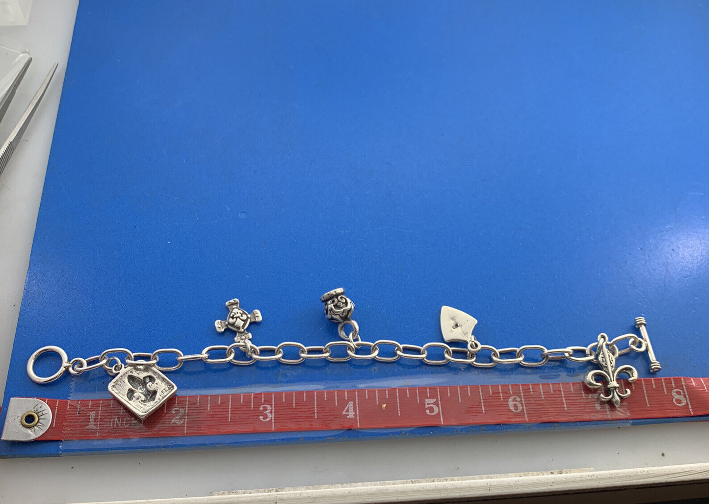 Designer 925 Sterling Silver Five Fleur De Lis Charm Oval Link Toggle Bracelet