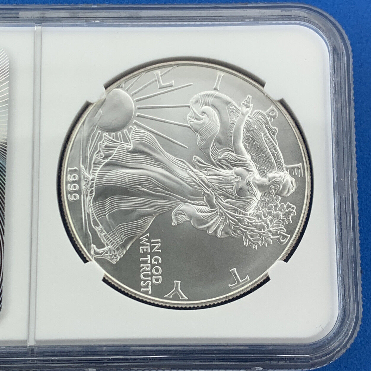 1999 $1 American .999 Silver Eagle Reverse Struck Thru Mint Error NGC MS69 Coin