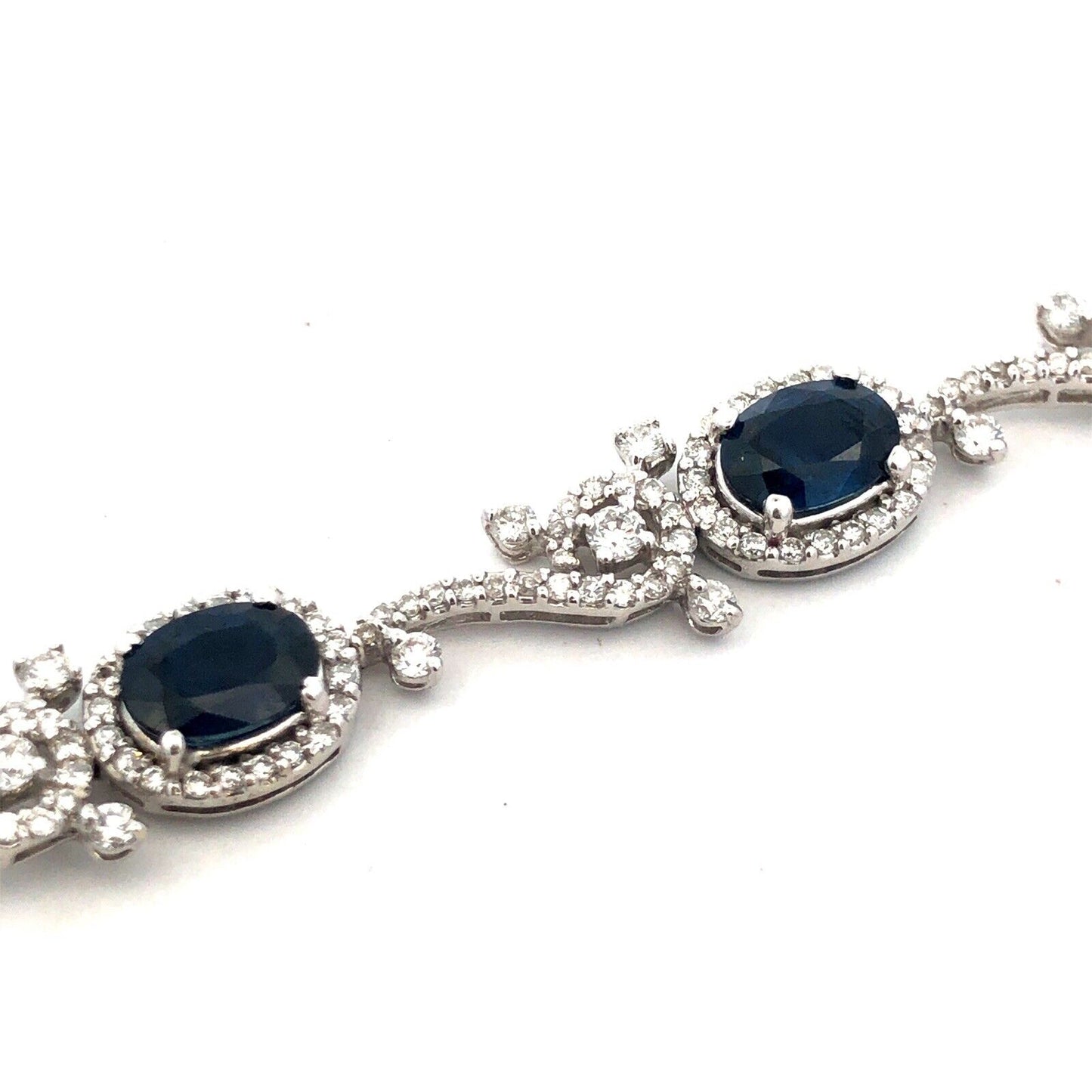 Designer K 18K White Gold Oval Blue Sapphire Diamond Swirl Tennis Bracelet
