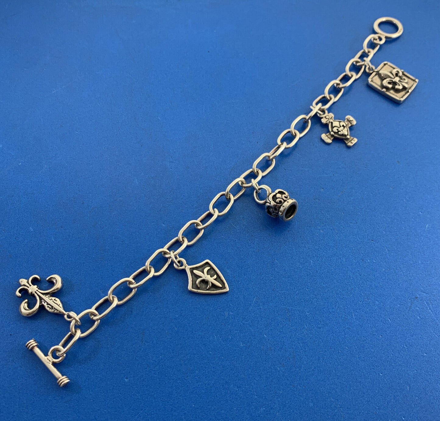 Designer 925 Sterling Silver Five Fleur De Lis Charm Oval Link Toggle Bracelet