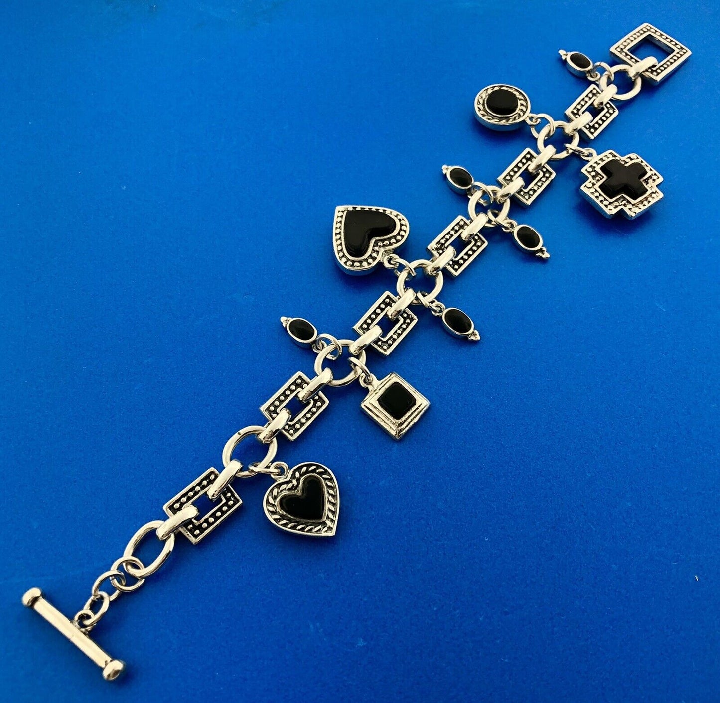Vintage Mexico 925 Sterling Silver Black Onyx Heart Cross Toggle Charm Bracelet