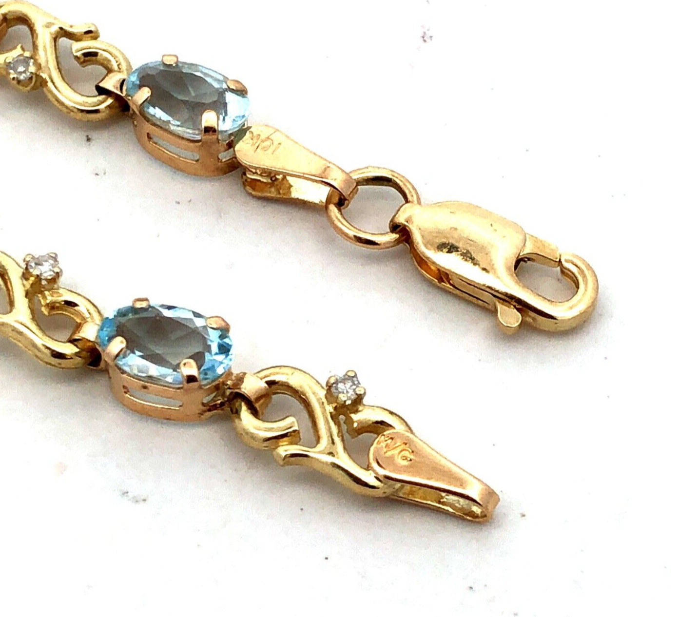 Designer MC 10K Yellow Gold Oval Aquamarine Diamond Infinity Tennis Bracelet