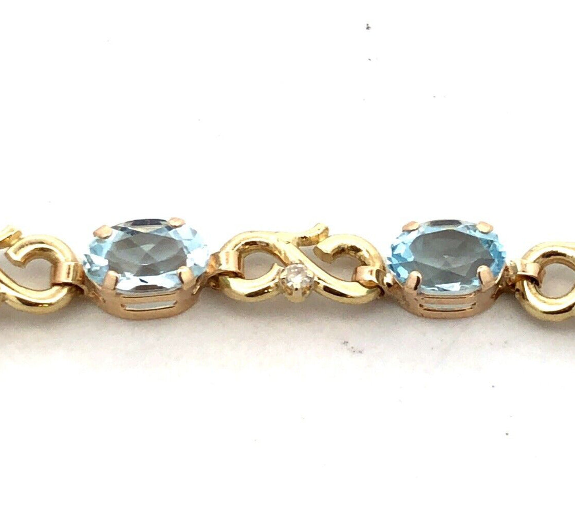 Designer MC 10K Yellow Gold Oval Aquamarine Diamond Infinity Tennis Bracelet