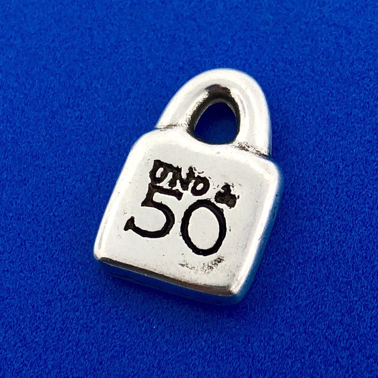 Designer Uno De 50 Silver Tone Sun Burst Purse Lock Charm Pendant