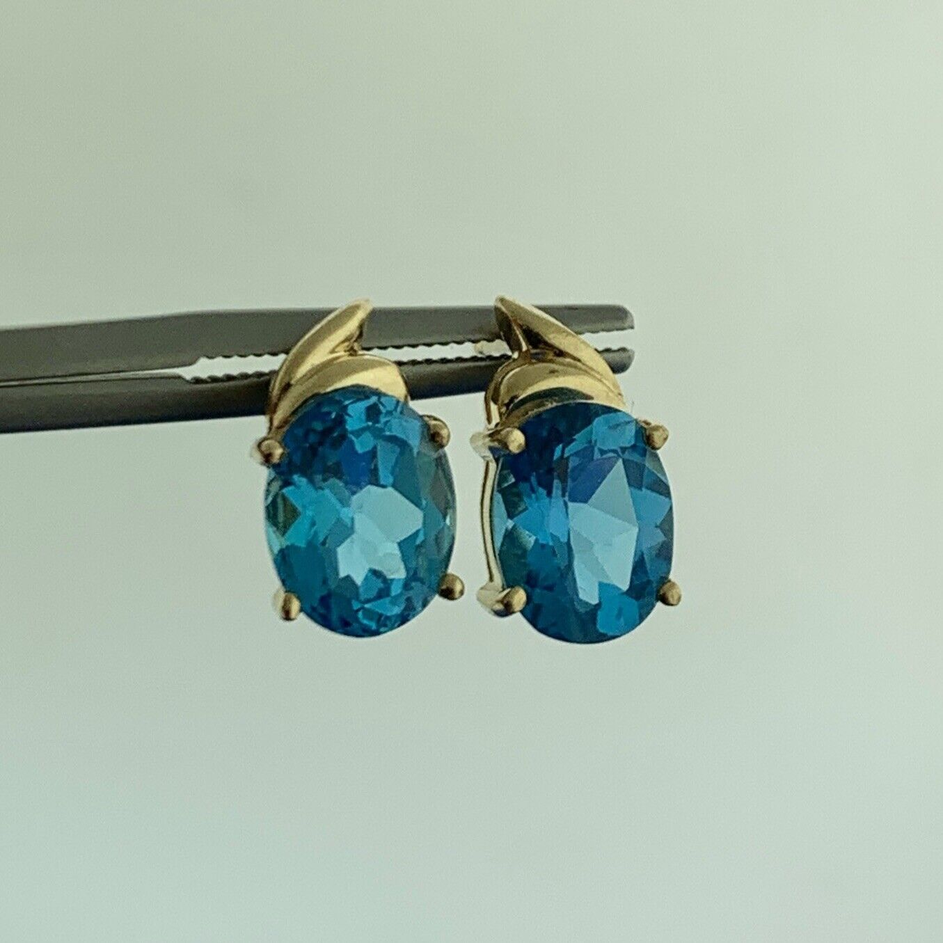 14K Yellow Gold Oval Blue Topaz December Anniversary Stud Earrings