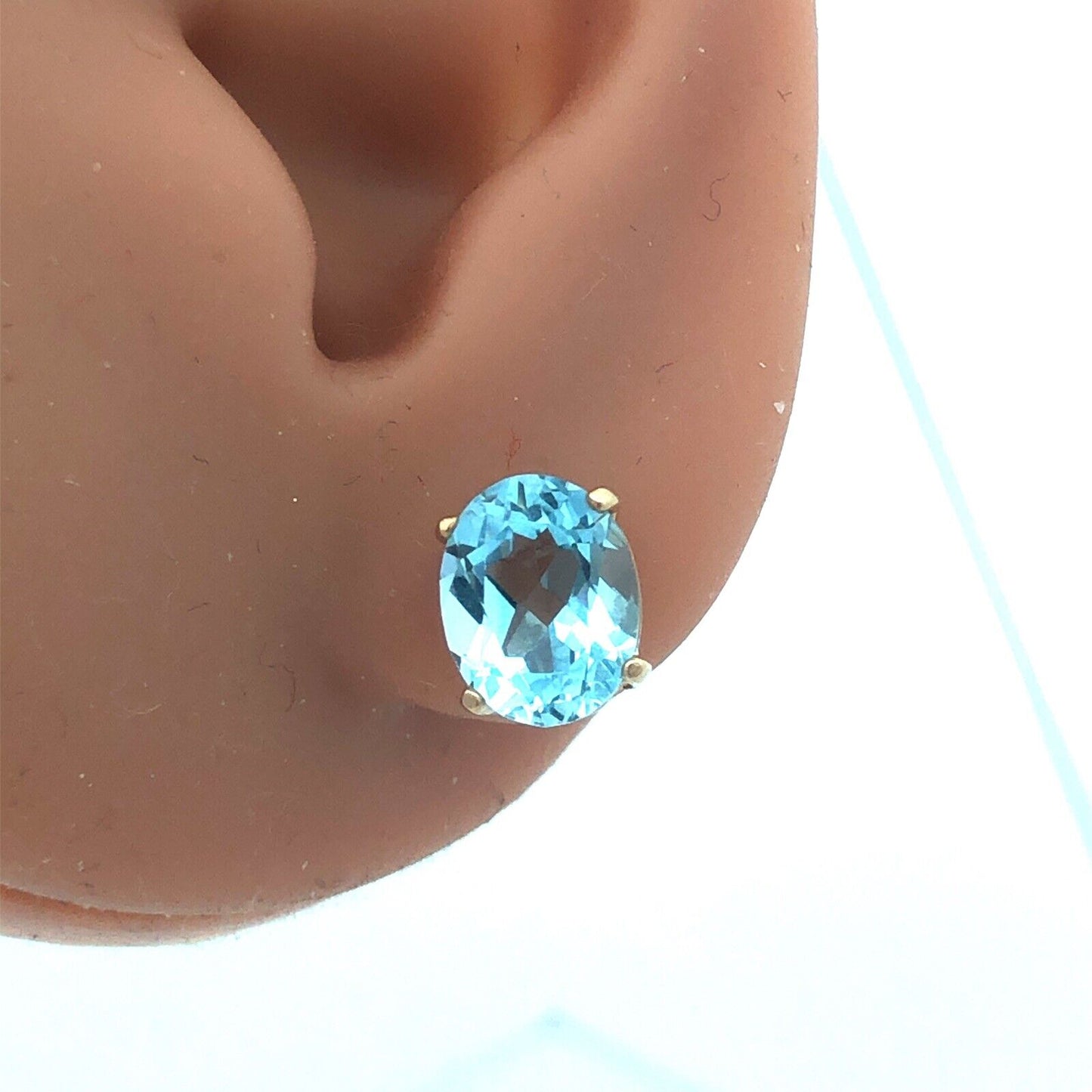 14K Yellow Gold Oval Blue Topaz Solitaire December Anniversary Stud Earrings