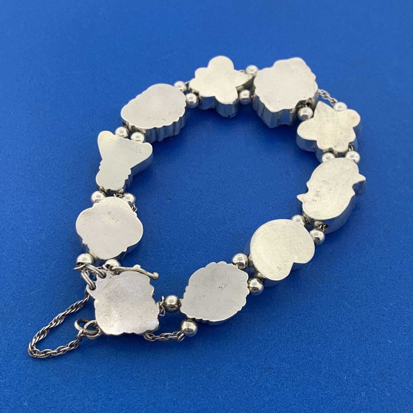 Shavarsh K 925 Sterling Silver Amethyst Floral Scroll Ten Charm Bracelet