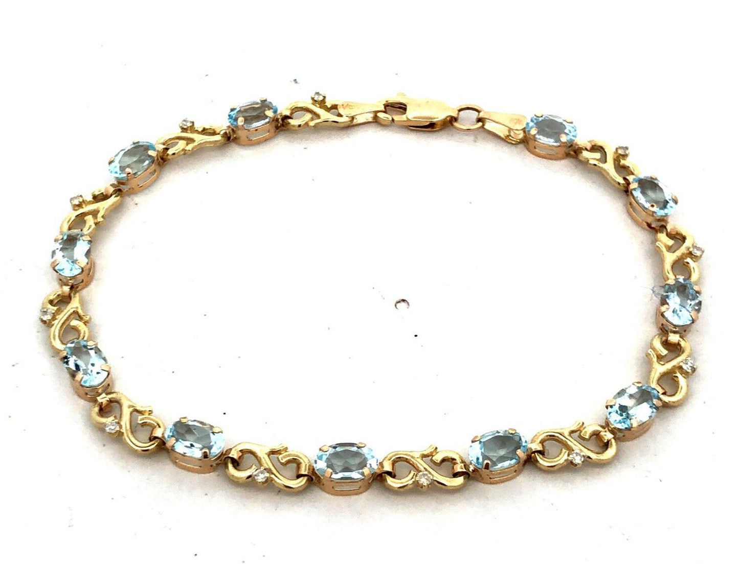 Designer MC 10K Yellow Gold Oval Aquamarine Diamond Infinity Tennis Bracelet