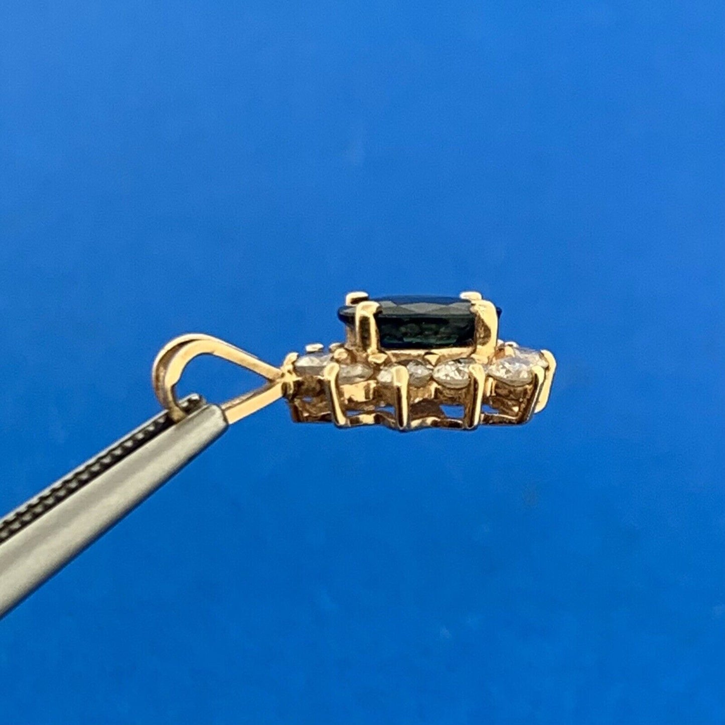 14K Yellow Gold Oval Blue Sapphire Diamond Halo Pendant