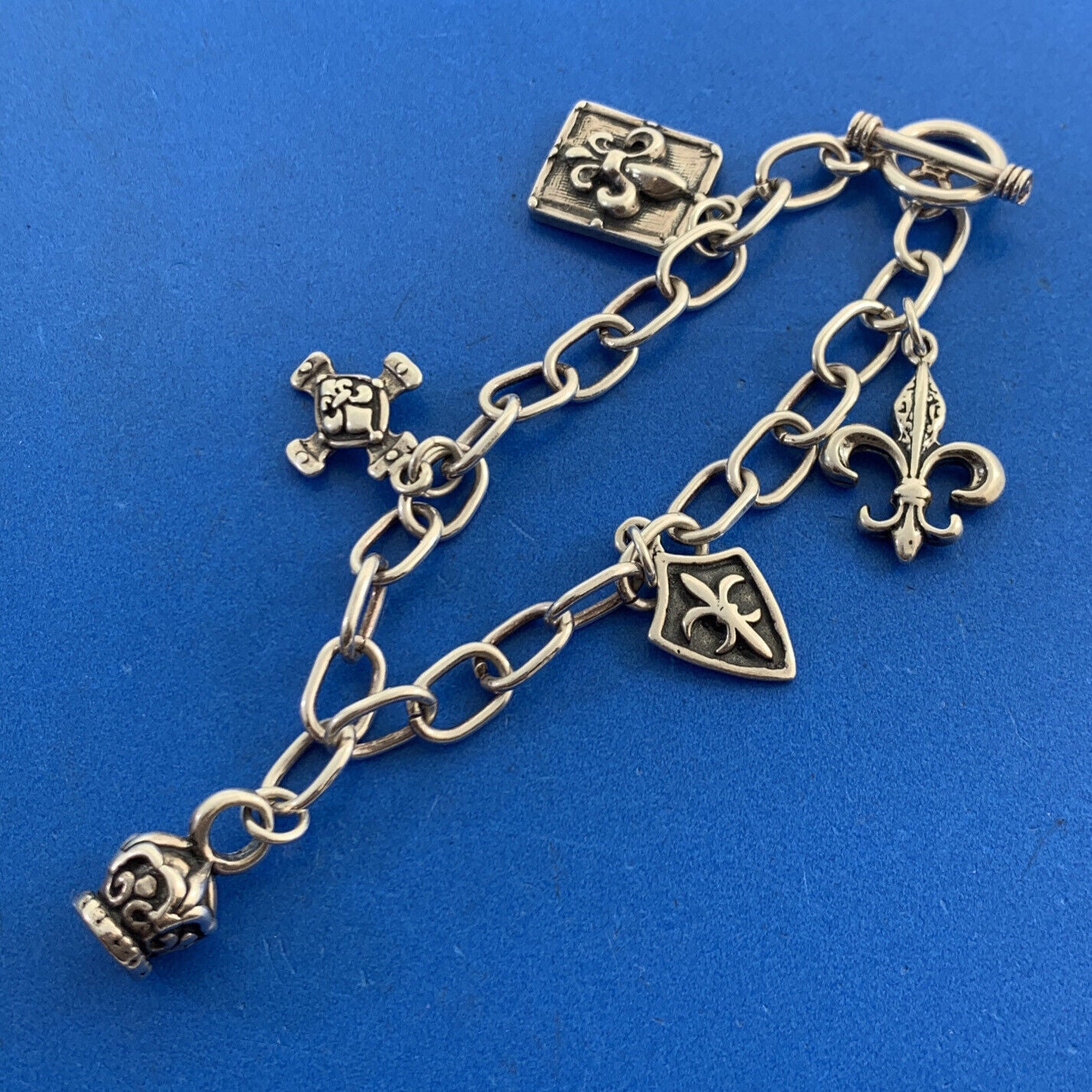 Designer 925 Sterling Silver Five Fleur De Lis Charm Oval Link Toggle Bracelet