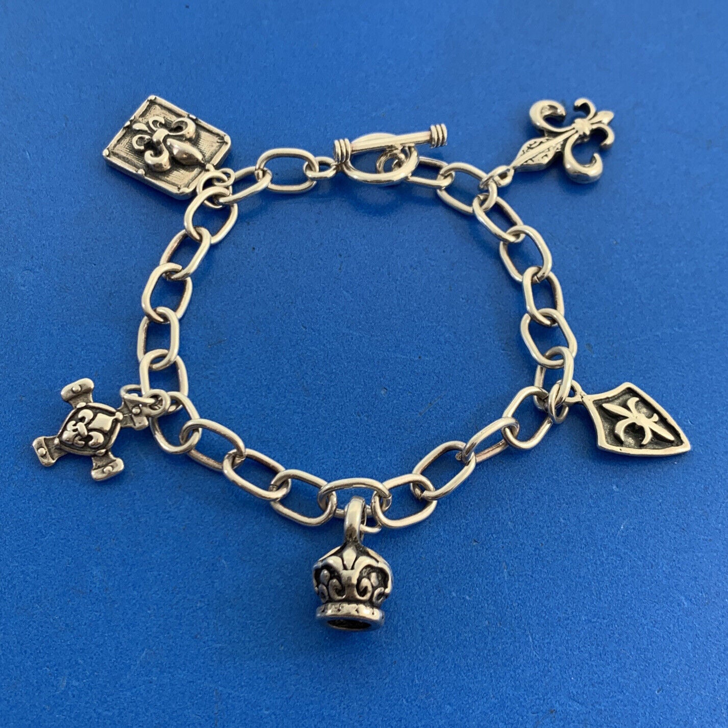 Designer 925 Sterling Silver Five Fleur De Lis Charm Oval Link Toggle Bracelet