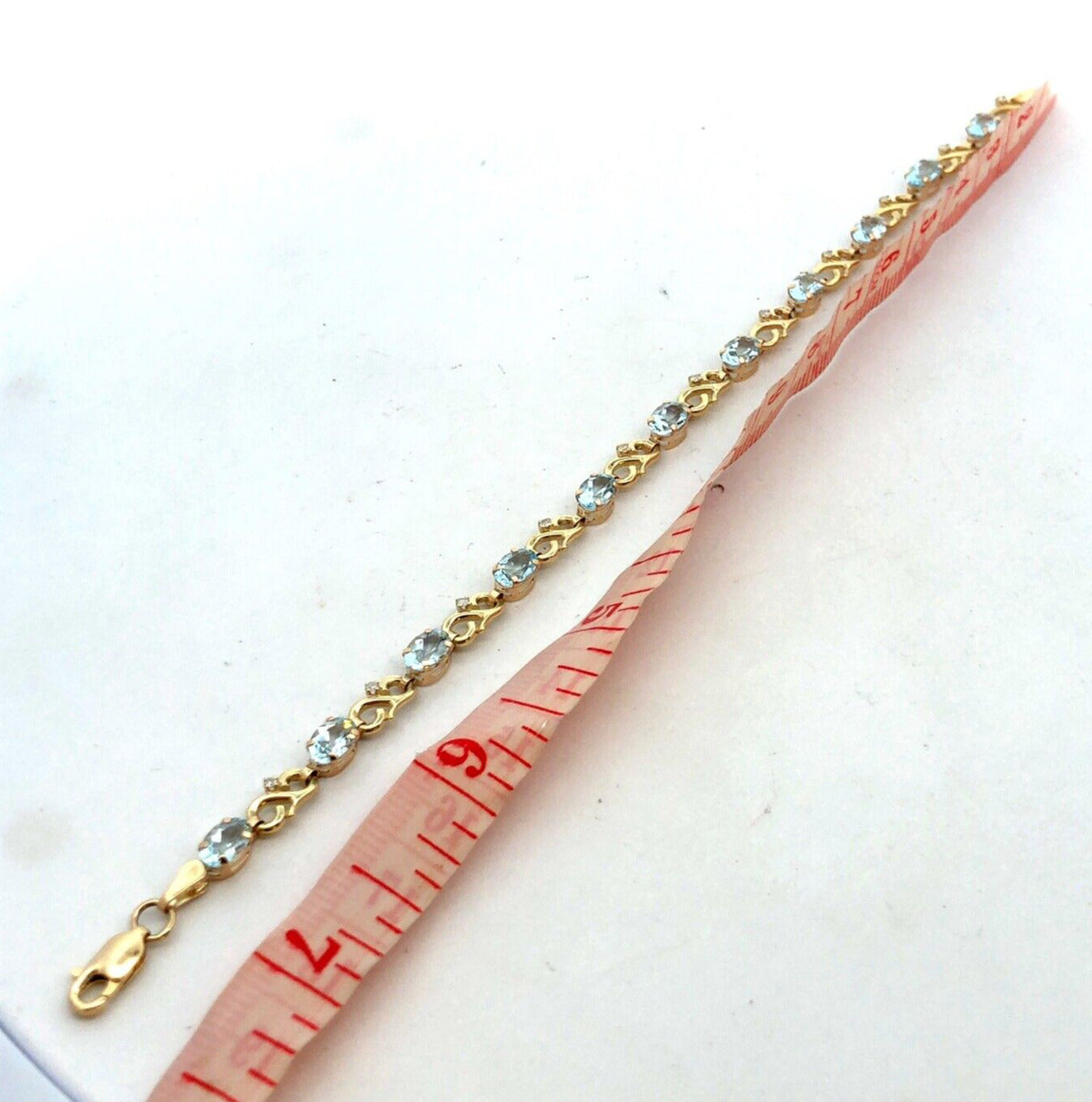 Designer MC 10K Yellow Gold Oval Aquamarine Diamond Infinity Tennis Bracelet
