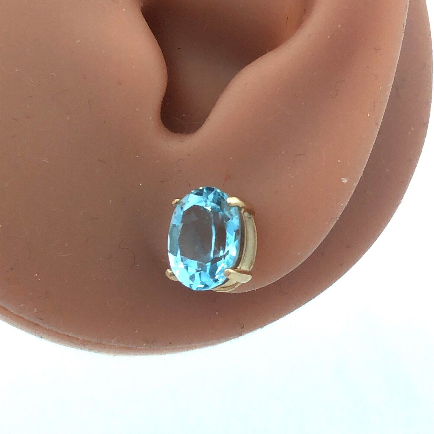 14K Yellow Gold Oval Blue Topaz Solitaire December Anniversary Stud Earrings