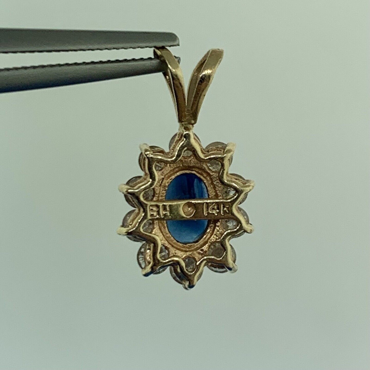 14K Yellow Gold Oval Blue Sapphire Diamond Halo Pendant