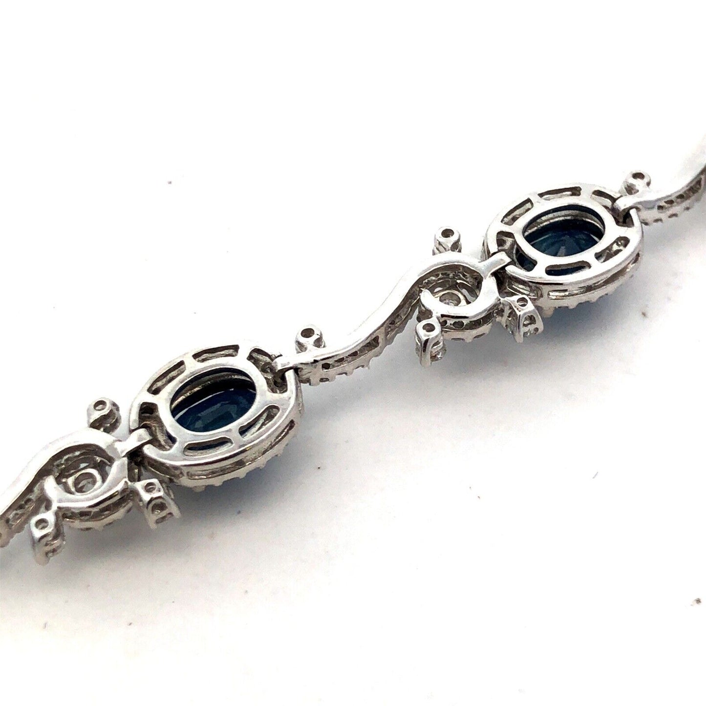Designer K 18K White Gold Oval Blue Sapphire Diamond Swirl Tennis Bracelet