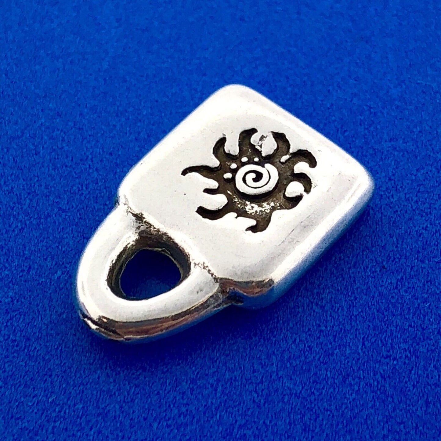 Designer Uno De 50 Silver Tone Sun Burst Purse Lock Charm Pendant