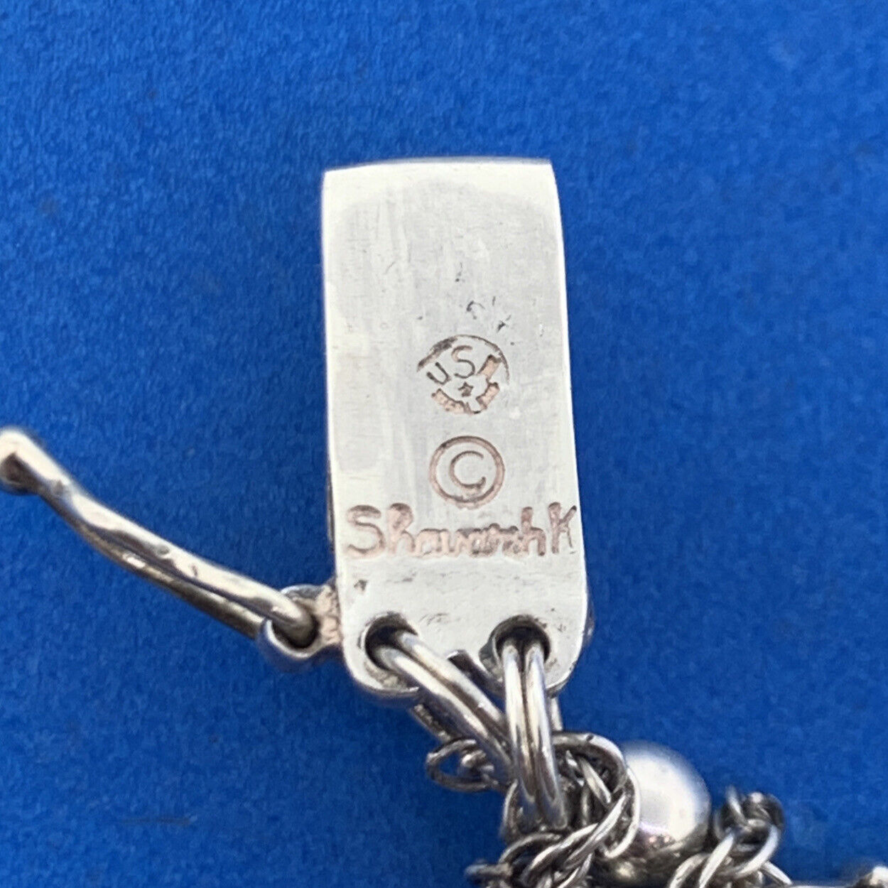 Shavarsh K 925 Sterling Silver Amethyst Floral Scroll Ten Charm Bracelet