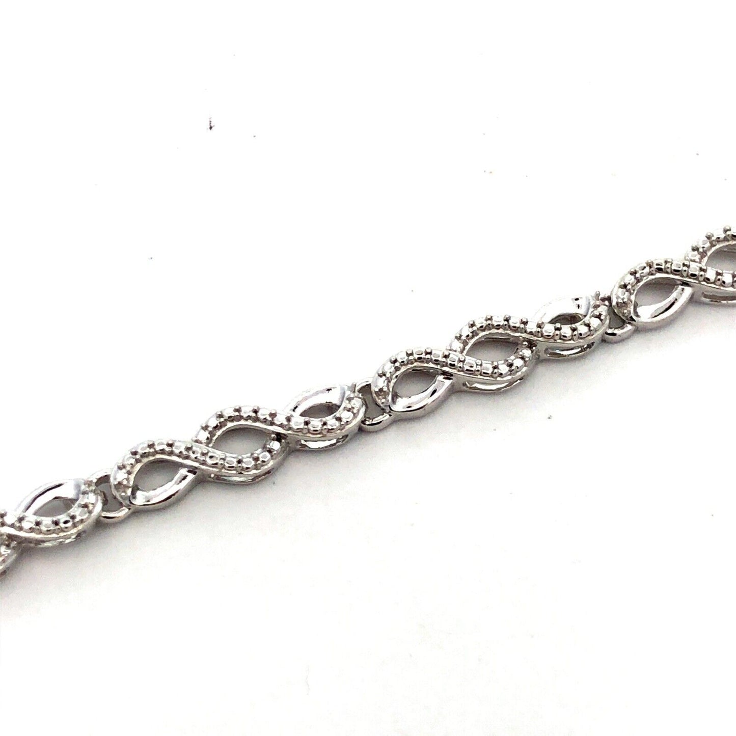 925 Sterling Silver Designer JWBR Textured Infinity Anniversary Tennis Bracelet