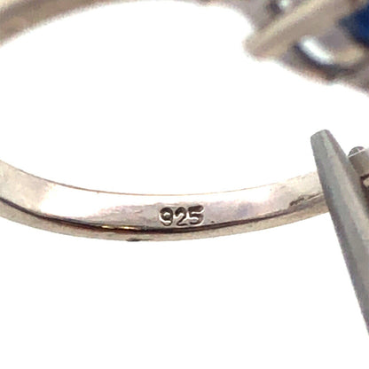 925 Sterling Silver Oval Blue Spinel Trio Round Diamond Accented Ring