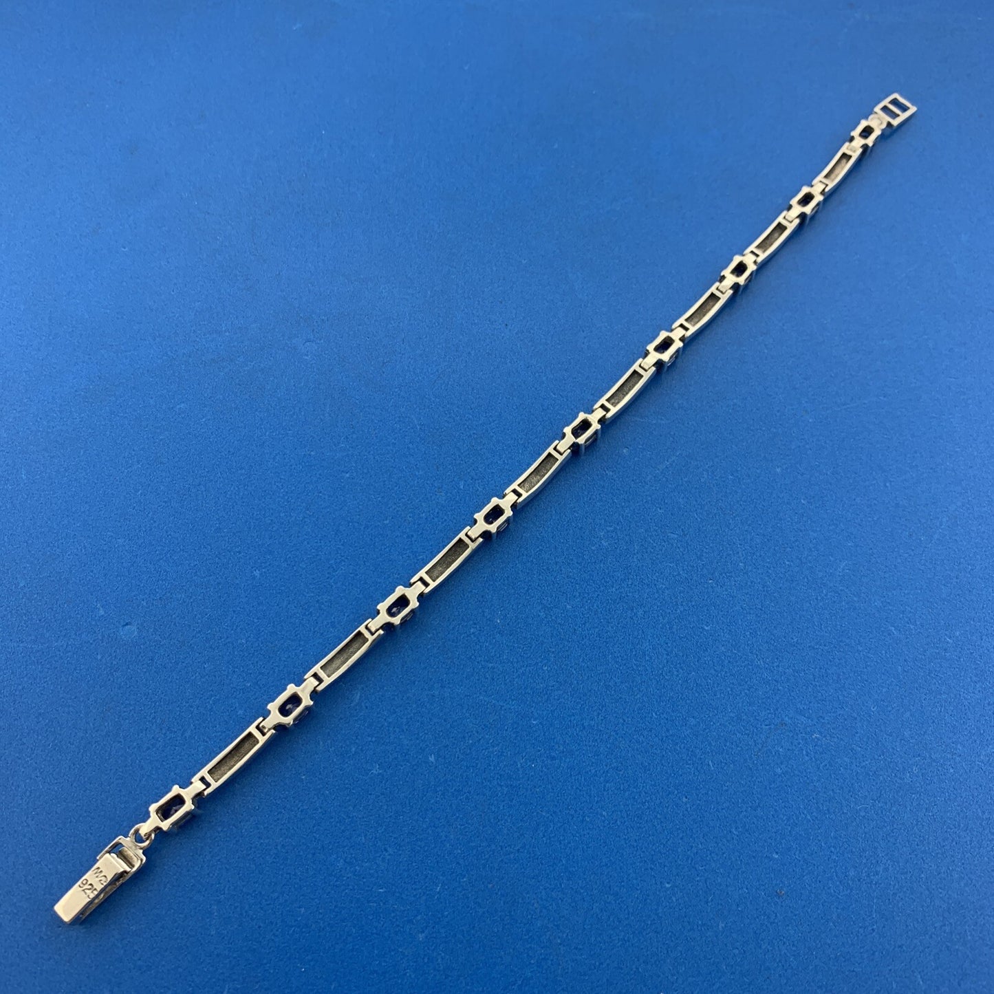 925 Sterling Silver Oval Tanzanite Marcasite Accented Tennis Bracelet
