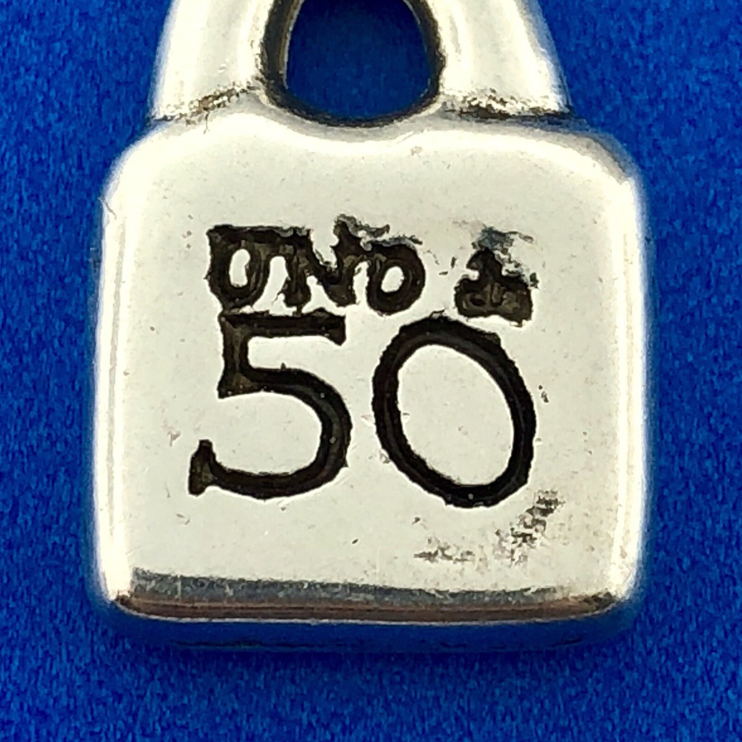 Designer Uno De 50 Silver Tone Sun Burst Purse Lock Charm Pendant