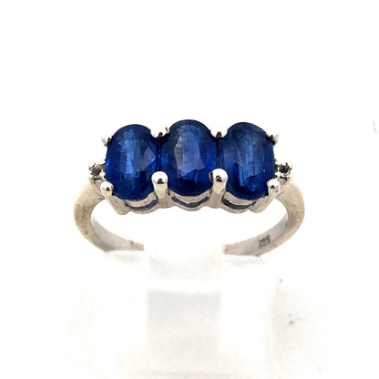 925 Sterling Silver Oval Blue Spinel Trio Round Diamond Accented Ring
