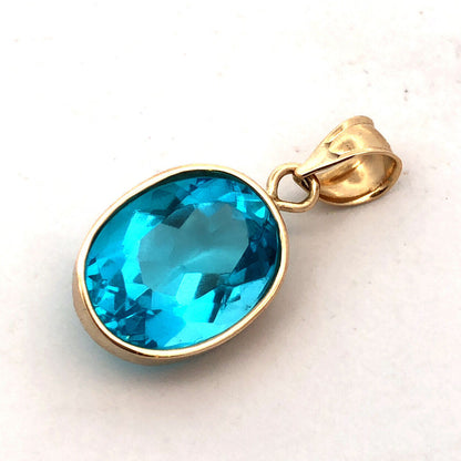Designer H 14K Yellow Gold Oval Blue Cubic Zirconia CZ Solitaire Bezel Pendant