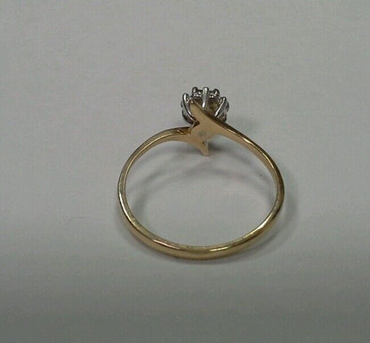 10k Yellow Gold Ring with .05tcw 1/20 Diamond Cluster Size 6.25