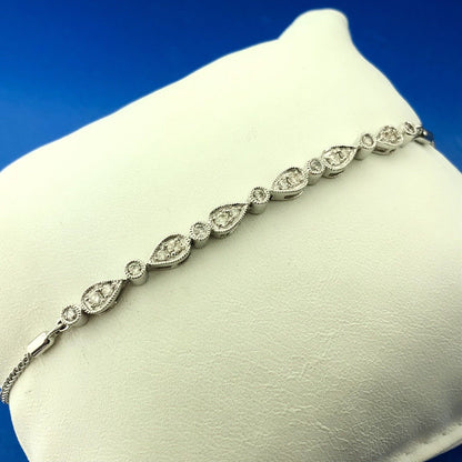 Designer KA1772 10K White Gold Diamond Floral Cluster Adjustable Lariat Bracelet