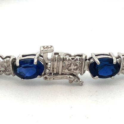 Stunning 10K White Gold Simulated Sapphire Diamond Anniversary Tennis Bracelet