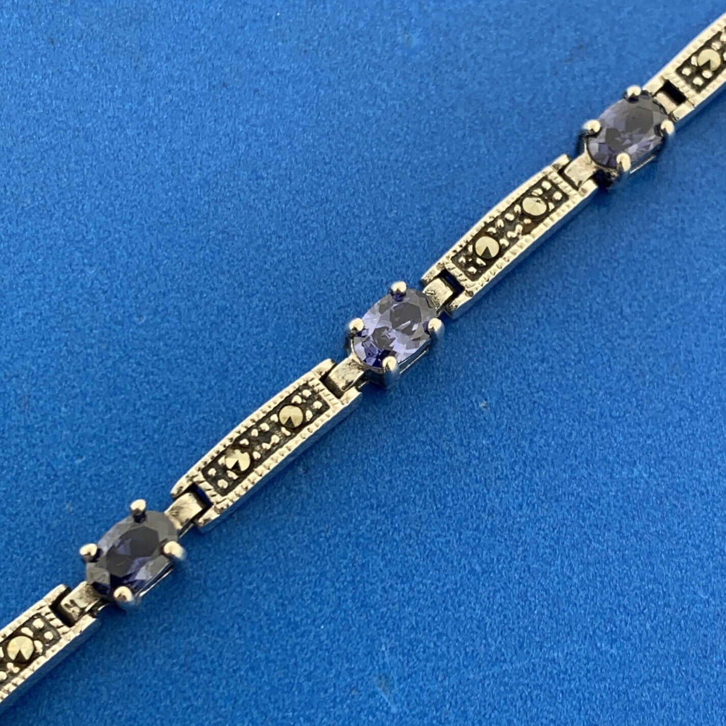 925 Sterling Silver Oval Tanzanite Marcasite Accented Tennis Bracelet