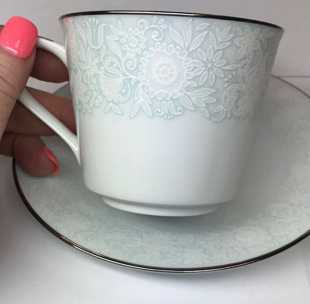 Retired Noritake Ravel Pattern White Flowers w/Blue Silver Trim Cup/Saucer Set