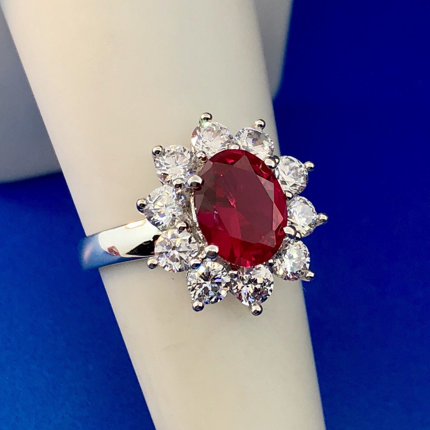 Stunning Siri Sterling Silver Oval Ruby Cubic Zirconia CZ Halo Cocktail Ring