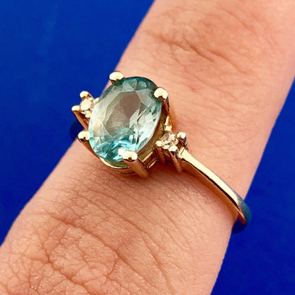 14k Yellow Gold Oval Blue Topaz Ring with Diamond Accents