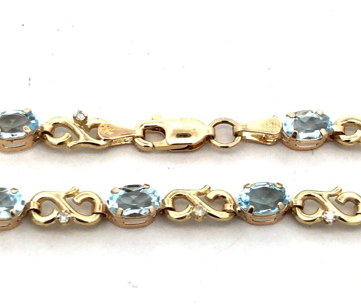 Designer MC 10K Yellow Gold Oval Aquamarine Diamond Infinity Tennis Bracelet