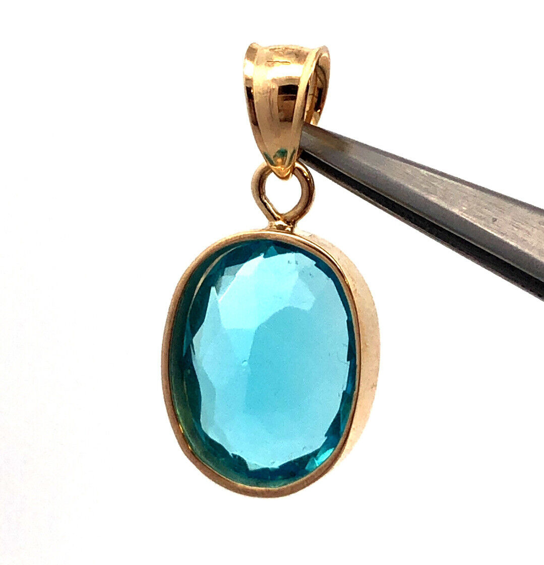 Designer H 14K Yellow Gold Oval Blue Cubic Zirconia CZ Solitaire Bezel Pendant