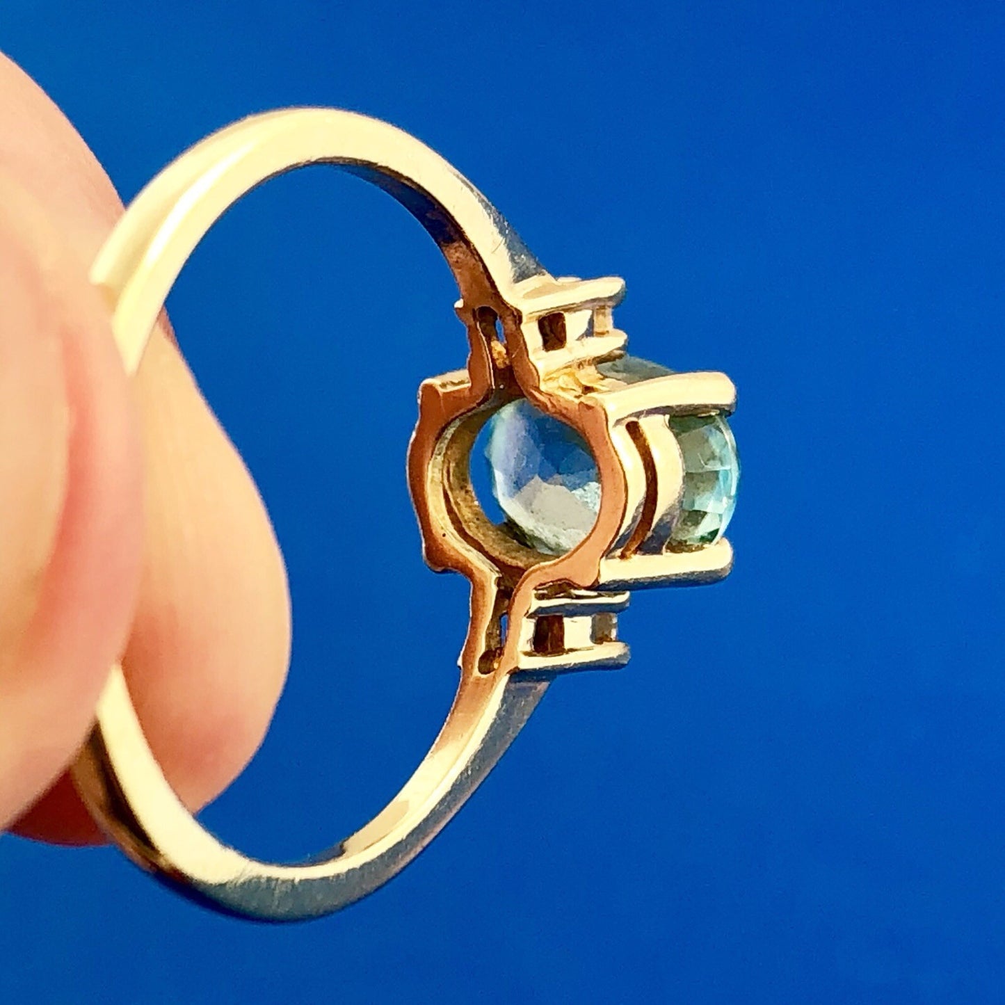 14k Yellow Gold Oval Blue Topaz Ring with Diamond Accents