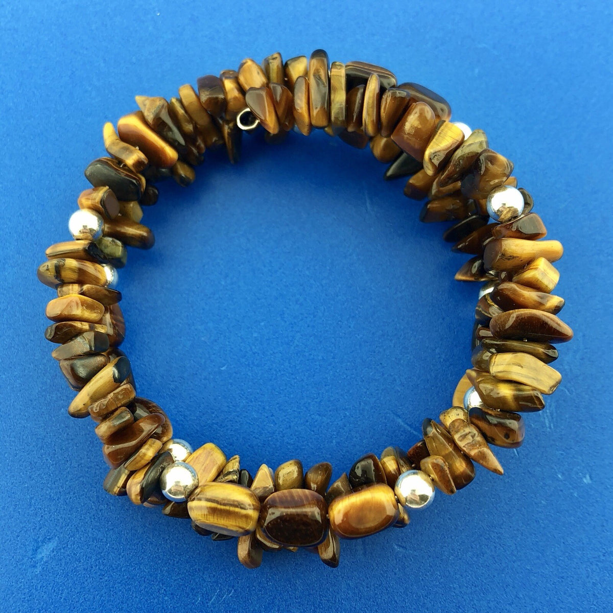 Sterling Silver Tigers Eye Bead Protection Three Wrap Flex Bracelet