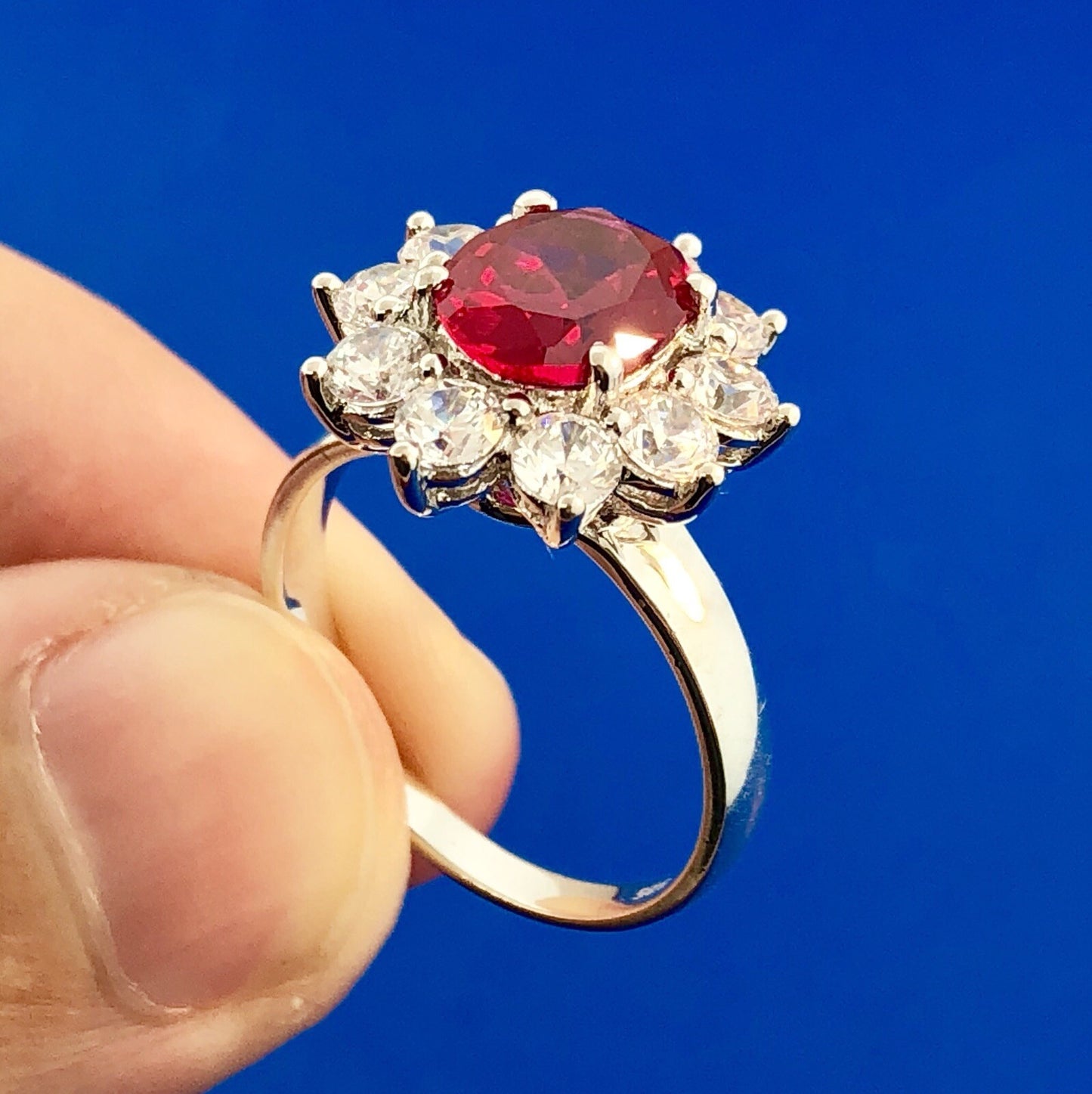 Stunning Siri Sterling Silver Oval Ruby Cubic Zirconia CZ Halo Cocktail Ring
