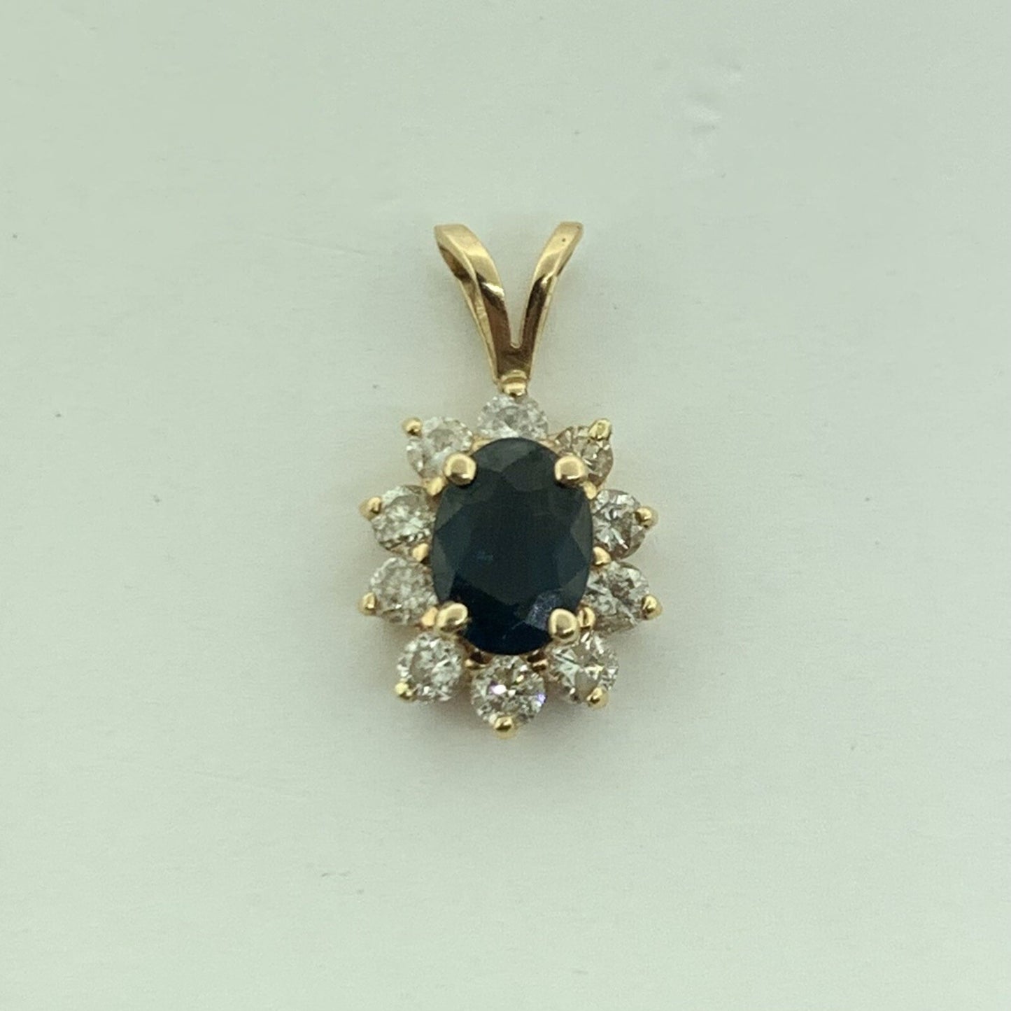 14K Yellow Gold Oval Blue Sapphire Diamond Halo Pendant