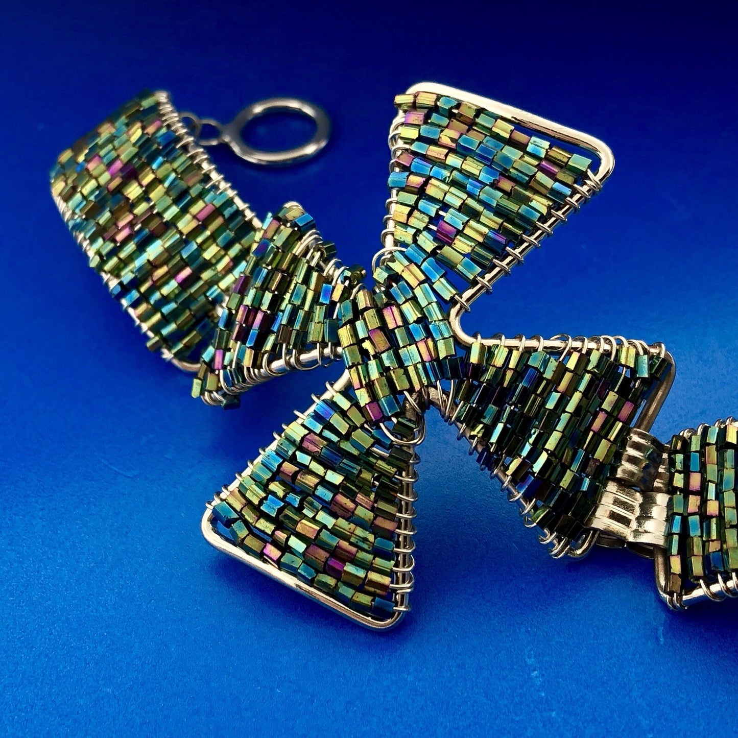Artisan Silver Tone Iridescent Cylinder Bead Wire Wrapped Cross Toggle Bracelet