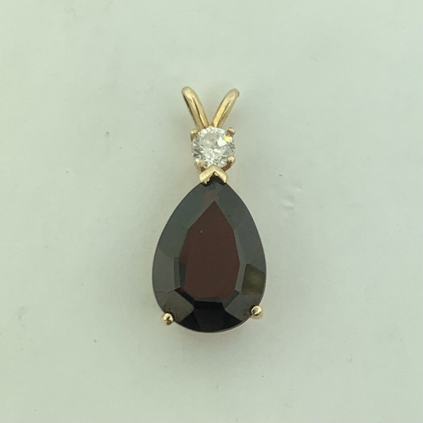 14K Yellow Gold Pear Shaped Garnet Round Diamond Accented Teardrop Pendant