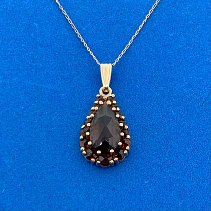 Vintage 14K Yellow Gold Pear Garnet Solitaire w/Halo January Pendant Necklace